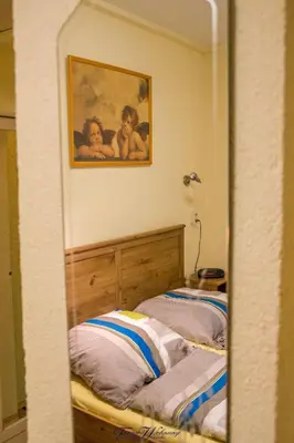Ein Bett oder Betten in einem Zimmer der Unterkunft Ferienwohnung Franziska Wünsche, Wohnung 1