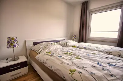 Ein Bett oder Betten in einem Zimmer der Unterkunft Dresden grüßt seine Gäste