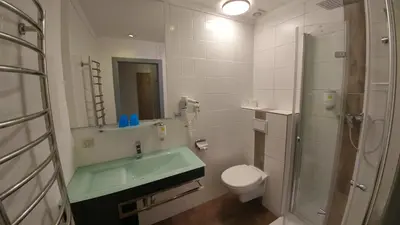 Ein Badezimmer in der Unterkunft Hotel Goldener Anker