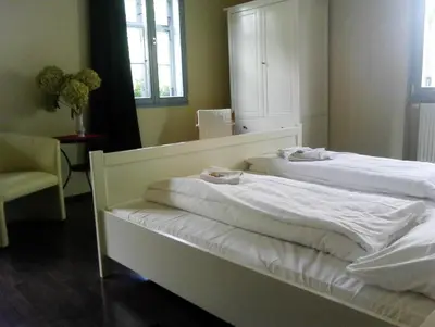 Ein Bett oder Betten in einem Zimmer der Unterkunft Alte Apotheke