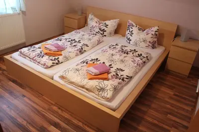 Ein Bett oder Betten in einem Zimmer der Unterkunft Ferienwohnung Am Hegebusch