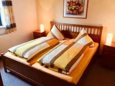 Ein Bett oder Betten in einem Zimmer der Unterkunft Haus am Gründel