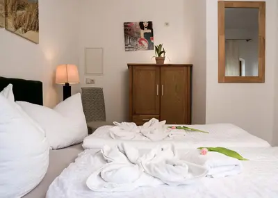 Ein Bett oder Betten in einem Zimmer der Unterkunft Trobischhof