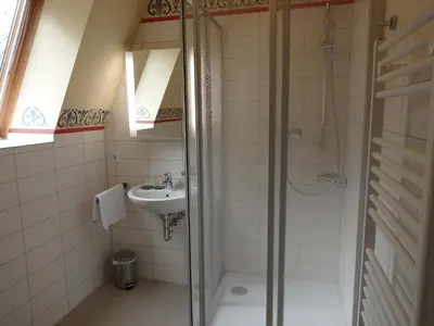 Ein Badezimmer in der Unterkunft Parkhotel Muldental