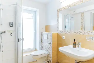 Ein Badezimmer in der Unterkunft Boutique Hotel am Schillerplatz