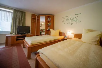 Ein Bett oder Betten in einem Zimmer der Unterkunft Ferienwohnung Kopprasch