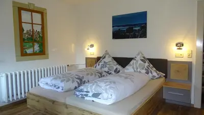 Ein Bett oder Betten in einem Zimmer der Unterkunft Pension 