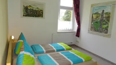 Ein Bett oder Betten in einem Zimmer der Unterkunft Ferienwohnung 