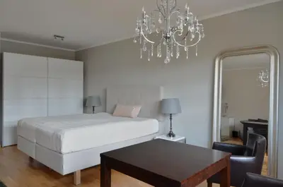 Ein Bett oder Betten in einem Zimmer der Unterkunft Dresden City Exklusiv