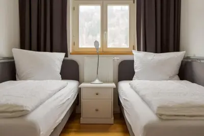 Ein Bett oder Betten in einem Zimmer der Unterkunft Villa Elbufer