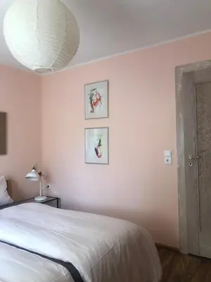 Ein Bett oder Betten in einem Zimmer der Unterkunft Wohlfühloase Dresden Nickern