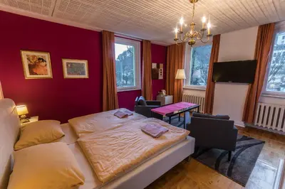 Ein Bett oder Betten in einem Zimmer der Unterkunft Pension Menge