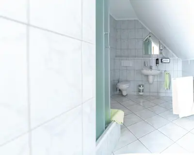 Ein Badezimmer in der Unterkunft Landhotel Biberburg