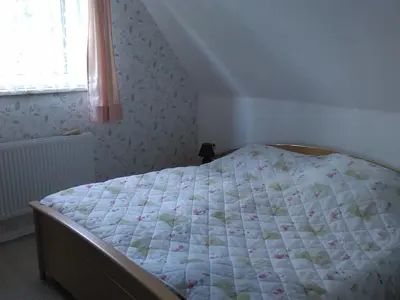 Ein Bett oder Betten in einem Zimmer der Unterkunft 