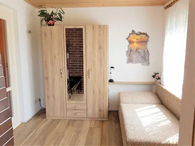 Ein Bett oder Betten in einem Zimmer der Unterkunft Bungalow Krzyzaniak