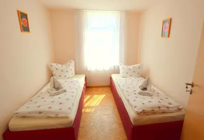 Ein Bett oder Betten in einem Zimmer der Unterkunft Cosis Ferienwohnung