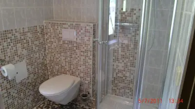 Ein Badezimmer in der Unterkunft XXL Ferienwohnung