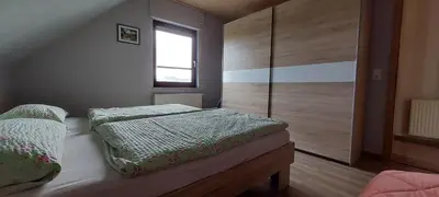 Ein Bett oder Betten in einem Zimmer der Unterkunft FeWo Schmidt im Erzgebirge