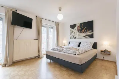 Ein Bett oder Betten in einem Zimmer der Unterkunft Lichtdurchflutetes Appartement im Hechtviertel