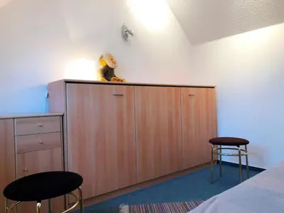 Ein Bett oder Betten in einem Zimmer der Unterkunft Ferienhaus Annemarie