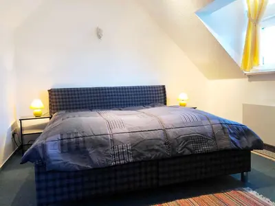 Ein Bett oder Betten in einem Zimmer der Unterkunft Ferienhaus Annemarie