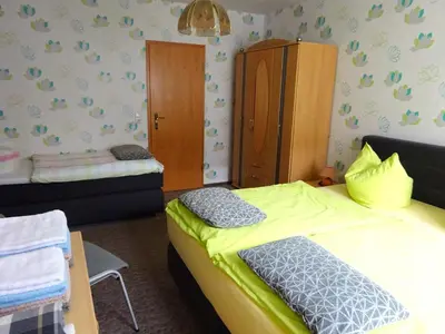 Ein Bett oder Betten in einem Zimmer der Unterkunft Ferienwohnung Pfanne