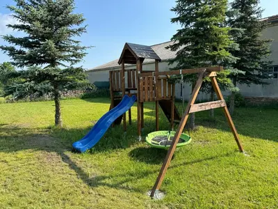 Ein Kinderspielbereich in der Unterkunft ECOVILLA - Natur pur