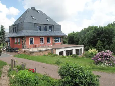 Ein Garten an der Unterkunft Beerenvilla