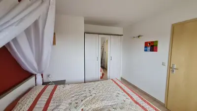 Ein Bett oder Betten in einem Zimmer der Unterkunft Ferienwohnng Sander