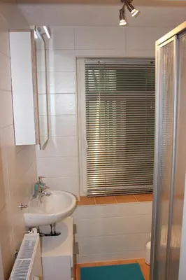 Ein Badezimmer in der Unterkunft Pension Holly
