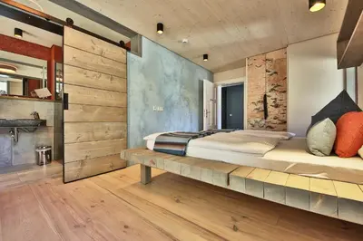 Ein Bett oder Betten in einem Zimmer der Unterkunft Bio-Hotel Villa Waldfrieden