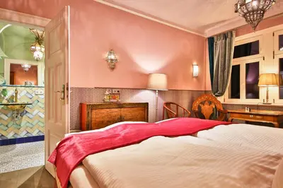 Ein Bett oder Betten in einem Zimmer der Unterkunft Bio-Hotel Villa Waldfrieden