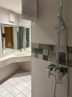Ein Badezimmer in der Unterkunft Ambiente Hotel Strehla