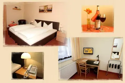 Ein Bett oder Betten in einem Zimmer der Unterkunft Hotel-Pension zum Markt
