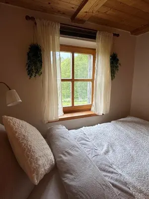 Ein Bett oder Betten in einem Zimmer der Unterkunft Ferienhaus Sohrmühle