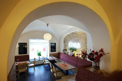 Ein Sitzbereich in der Unterkunft Hotel Arcus