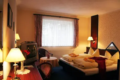 Ein Sitzbereich in der Unterkunft Familienhotel Zur Linde