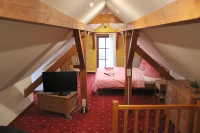 Ein Bett oder Betten in einem Zimmer der Unterkunft 
