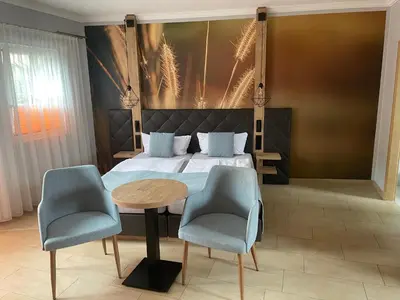 Ein Sitzbereich in der Unterkunft Hotel 