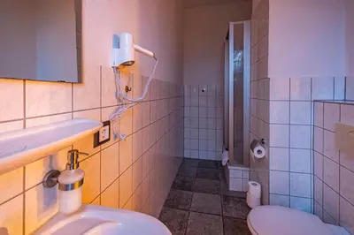 Ein Badezimmer in der Unterkunft Wasserschloss Podelwitz