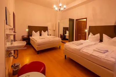 Ein Bett oder Betten in einem Zimmer der Unterkunft Wasserschloss Podelwitz