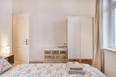 Ein Bett oder Betten in einem Zimmer der Unterkunft Dresden365 Ferienwohnung mit Privatparkplatz
