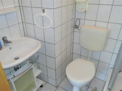 Ein Badezimmer in der Unterkunft Erbgericht
