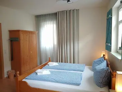 Ein Bett oder Betten in einem Zimmer der Unterkunft Bed and Breakfast Wehlen