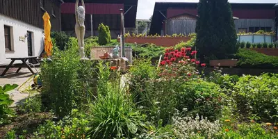 Ein Garten an der Unterkunft Windmühlenhof