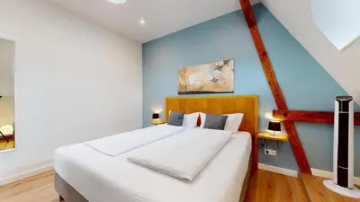 Ein Bett oder Betten in einem Zimmer der Unterkunft Apartment Senftenberg - 1907
