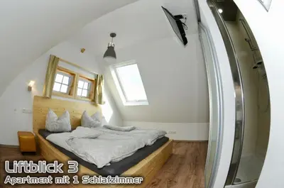 Ein Bett oder Betten in einem Zimmer der Unterkunft Ferienwohnungen 