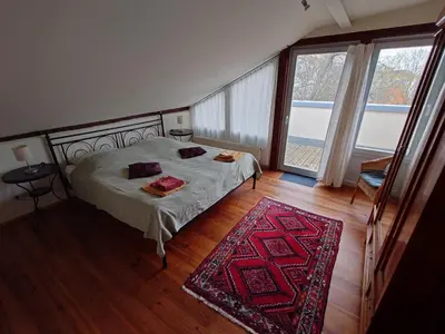 Ein Bett oder Betten in einem Zimmer der Unterkunft Ferienwohnungen Villa Haniel Sophie