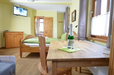 Ein Bett oder Betten in einem Zimmer der Unterkunft Landgasthof & Hotel Köhlerhütte