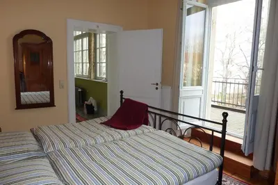 Ein Bett oder Betten in einem Zimmer der Unterkunft Ferienwohnungen Villa Haniel Paul
